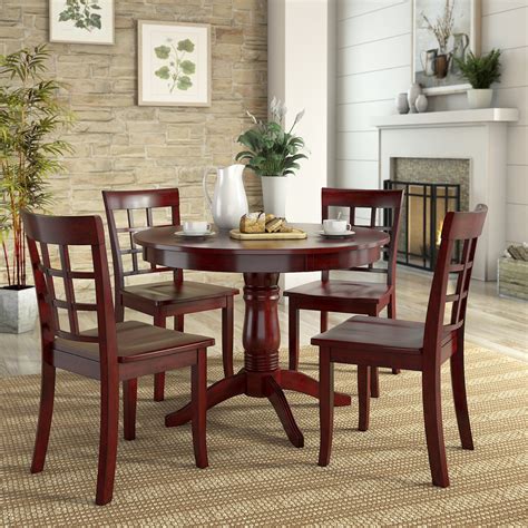 weathered wood dining table and chairs