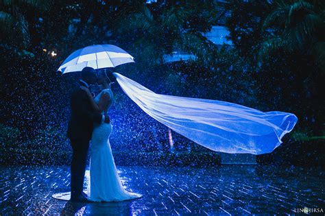 This rainy wedding day photo is absolutely magical! Nova 969