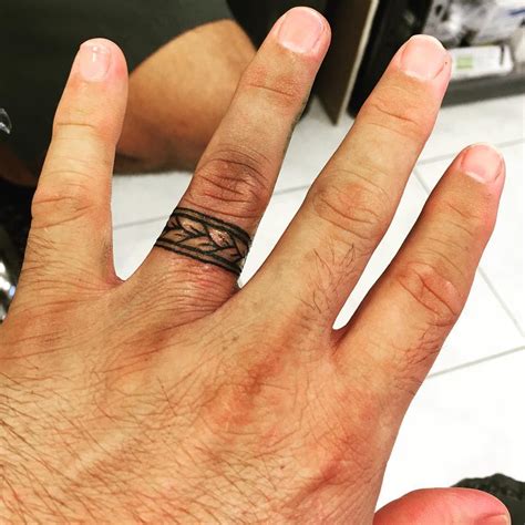 Powerful Wedding Ring Tattoo Designs For Men Ideas