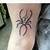 what do spider tattoos represent?
