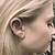 what does a spider web tattoo in the ear mean?