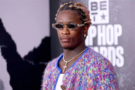 what charges are young thug facing