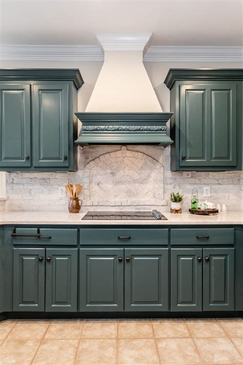 what color backsplash with green cabinets