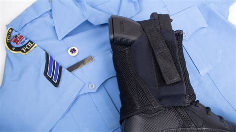 what do police carry gun