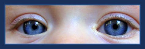 what does light colored eyes symbolize in the giver
