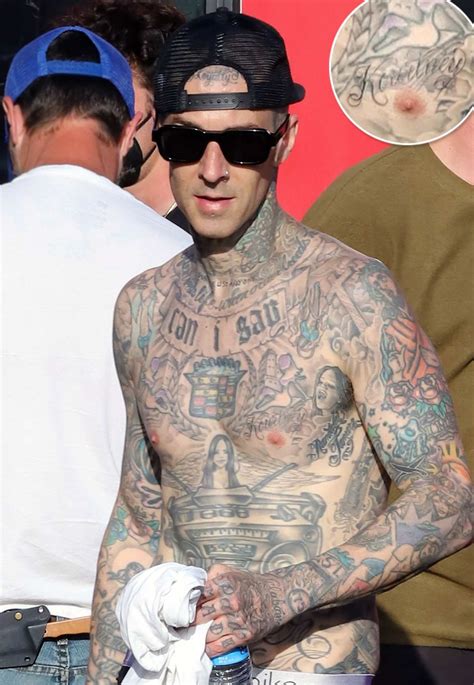 what does travis barker's chest tattoo say