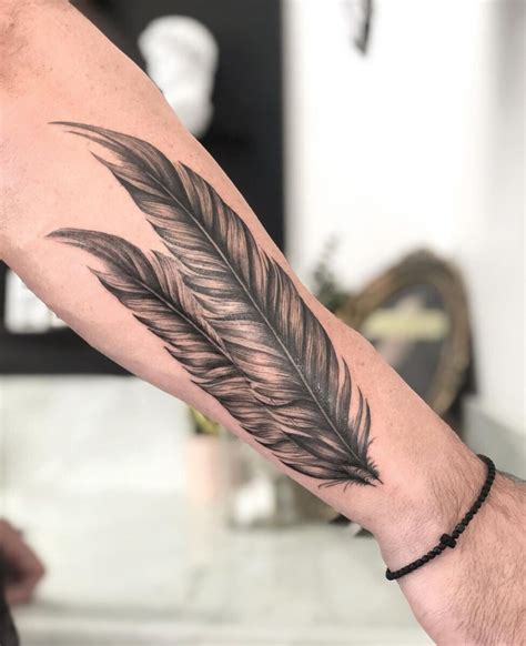 What Does Two Feathers Tattoo Mean
