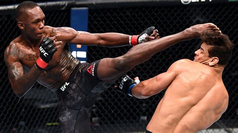 what fighting style does israel adesanya use