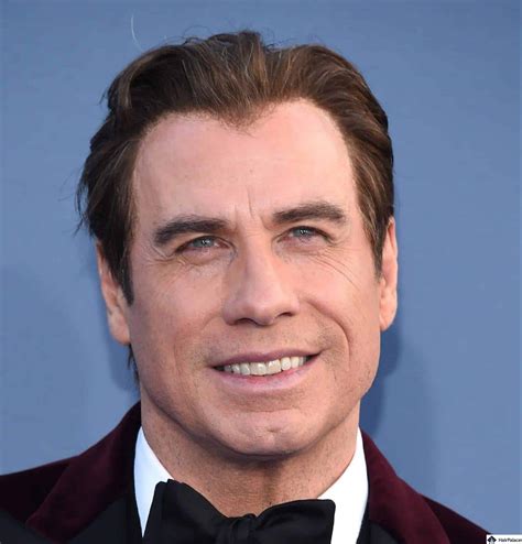 what happened to john travolta's hair