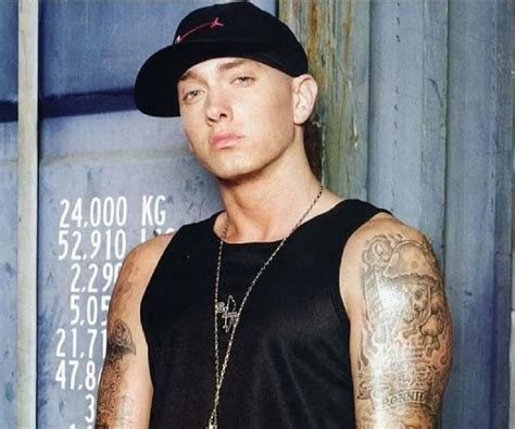 what is eminem's age