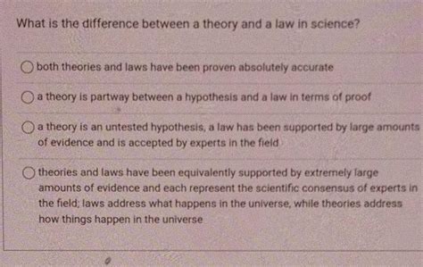 what is the difference between law and theory in science class 9