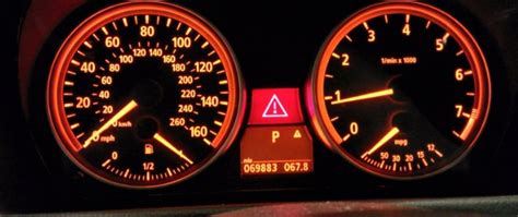What Is The Triangle Warning Light On Dashboard