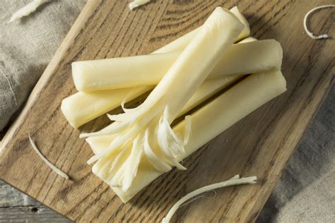 what makes string cheese stringy
