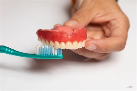 What Should You Brush Dentures With