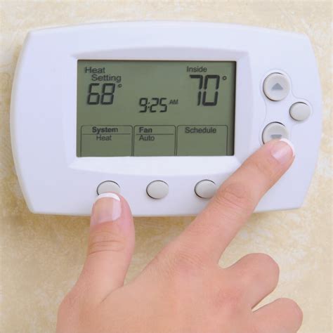 what temp to set heat in house