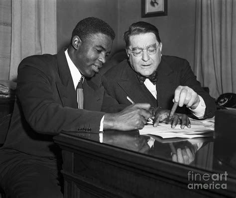 when did jackie robinson sign contract