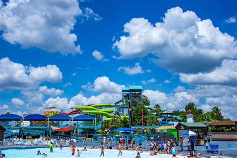 when does hurricane harbor open at six flags