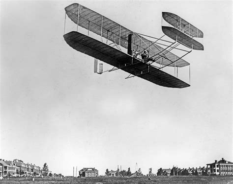when was the first engine powered plane invented