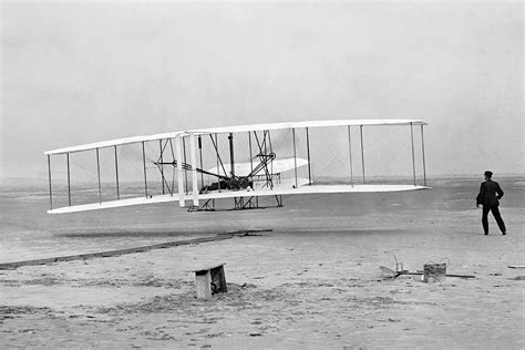 when was the first powered flight invented