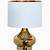 white and gold lamp