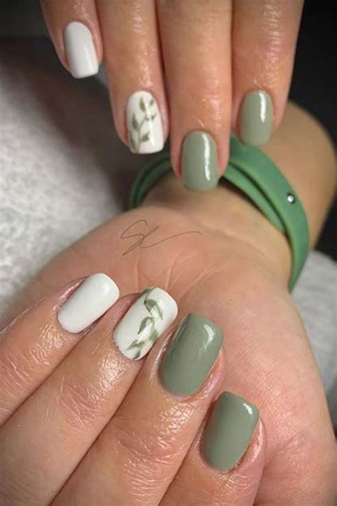 Summer 2019 Matte white nails with leaf accents Green nails, Matte white nails, White nails
