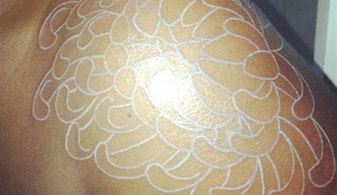 nice-lotus-white-ink-tattoo-on-knee | Tattoos for black skin, White