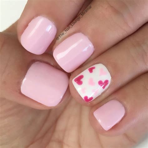 Pink, White and Sparkles Valentine Heart gel polish nails over non