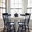 White Pedestal Table with Black Windsor Chairs Round dining room