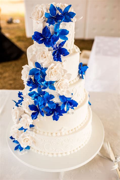 O Taste & See Cakes Blue Flowers & White Swan Wedding Cake