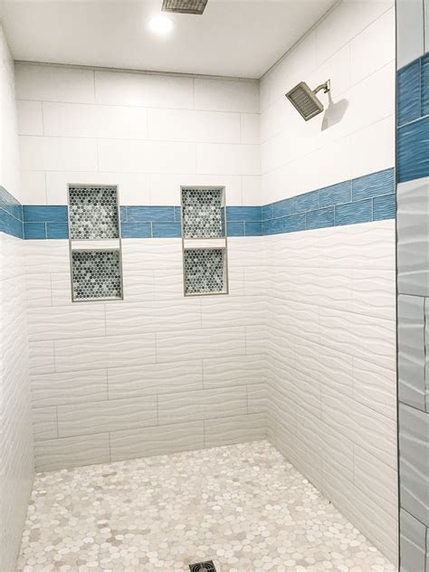 white and blue shower tile