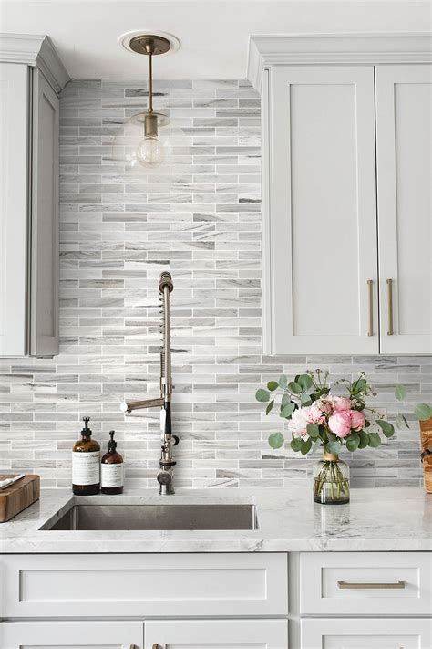 White Cabinets Marble Backsplash