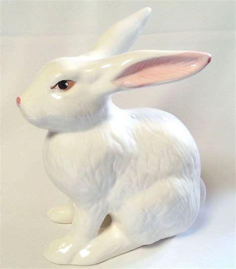 white ceramic rabbit figurines