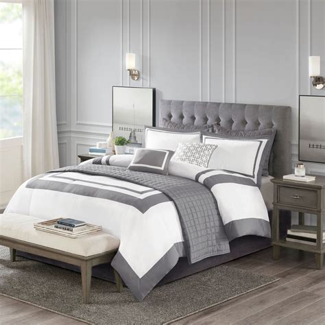 White Comforter Grey Headboard