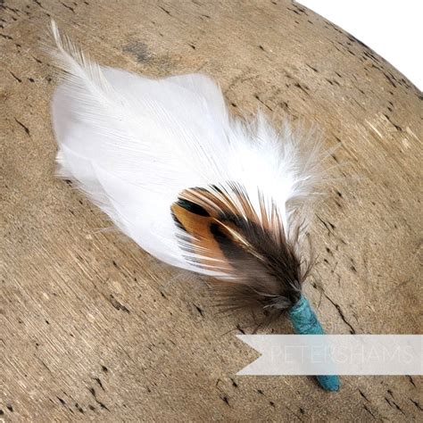 Discussion White Feather Hat Guards