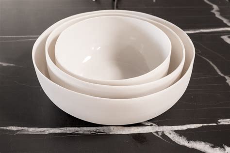 white porcelain salad bowls