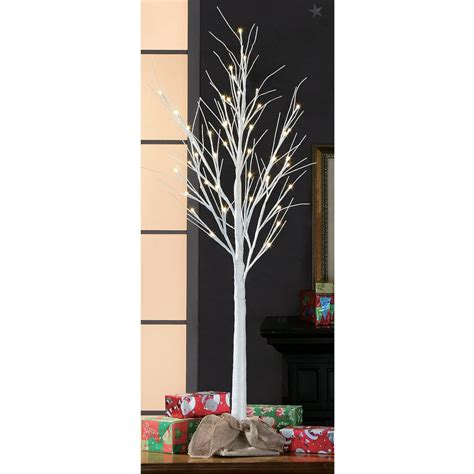 white stick christmas tree with lights
