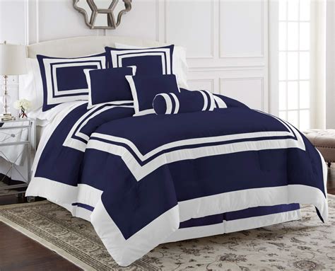 White With Navy Bedding