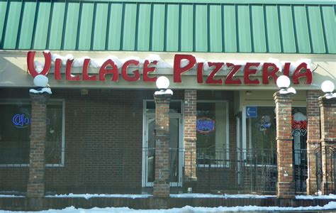 who owns village pizza in southwick ma