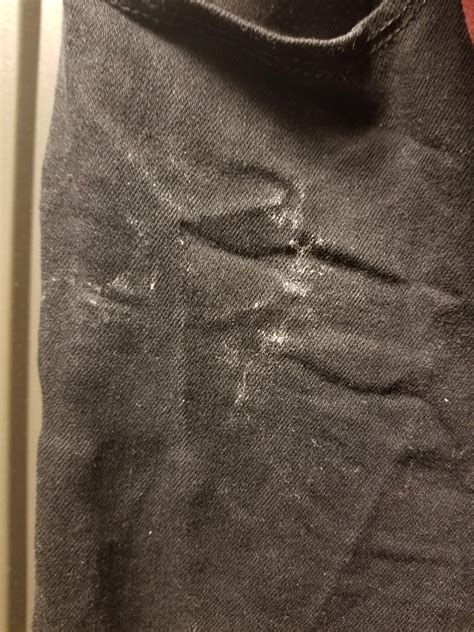 why are there white stains on my clothes after washing