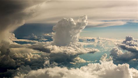why do clouds float in the sky