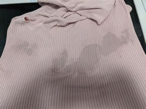why do my clothes have black spots after washing