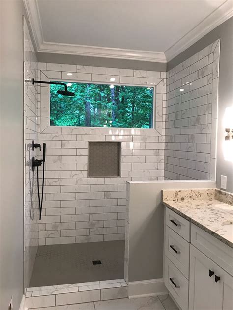 Frame window in shower with tile window in shower, bathroom windows