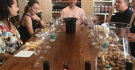 Participants blending wine in a workshop