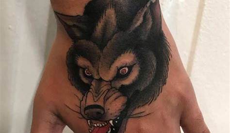 Snarling Wolf Hand Tattoo Hand tattoos, Hand tattoos for