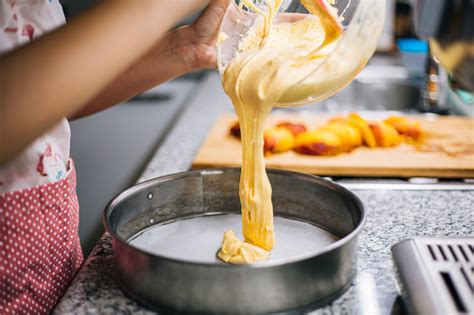  pouring batter into baking pan