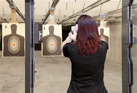 Woman target shooting