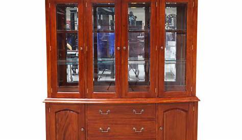 This Two Unit Teak Wood Display Cabinet With Glass Doors In The