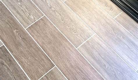 Grout Plus color seal custom matched to plank tile for seamless look