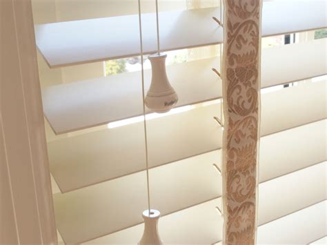 Enhance Your Home Decor with Stylish Wood Blinds Featuring Decorative Tape
