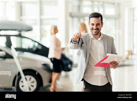 Picture Of Professional Salesperson Working In Car